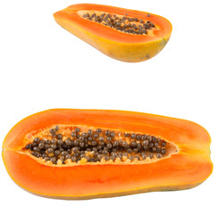 Cut papaya fruit over white background