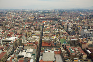 Fototapeta na wymiar Mexico city aerial view with mountains and clouds DF