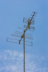 Classic Antenna like analog for TV on blue sky