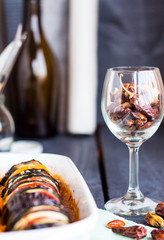 glass with spice, dried chilli, Ratatouille in white casserole