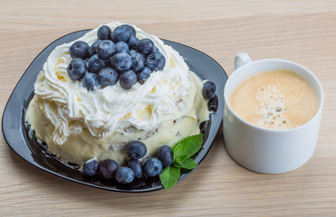 Coffee with blueberry cake