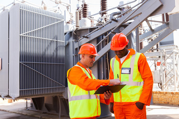 electrical engineers discussing work