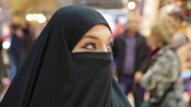 Steadycam, Woman with headscarf shopping at Grand Bazaar, Istanbul, Turkey