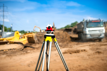 Surveyor equipment optical level or theodolite at construction