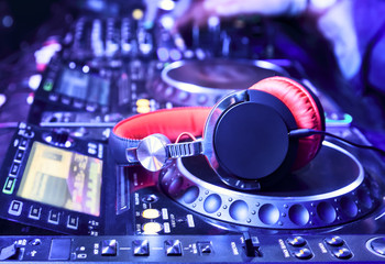 Dj mixer with headphones - obrazy, fototapety, plakaty