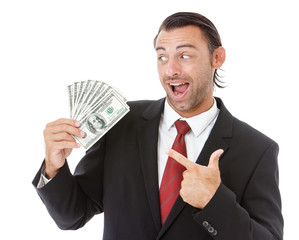Smiling handsome businessman holding money