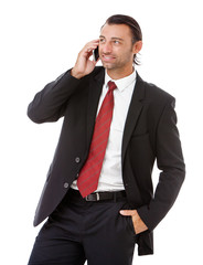 handsome young business man talking on the phone