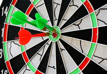 Dart board with darts