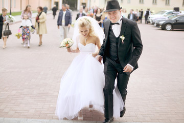 Fototapeta na wymiar bride and groom walking