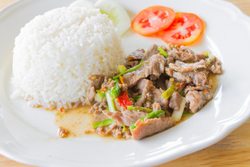 Sliced pork fried with chilies