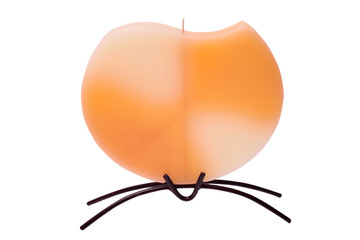 Obraz premium Orange candle on white background