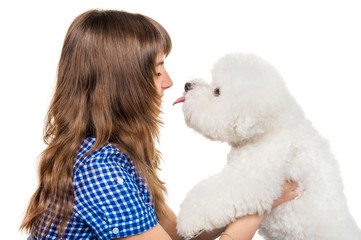 Obraz premium Girl with a dog breed bichon