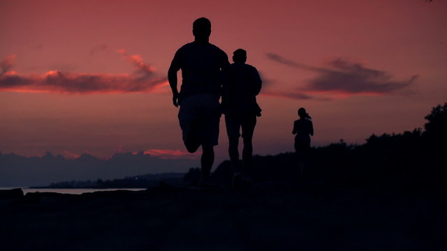 People jogging during beautiful sunset, super slow motion, 240fp