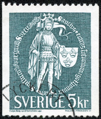 stamp shows Great Seal (St. Erik with Banner and Shield)