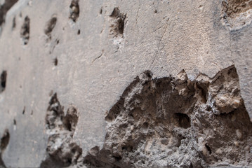 Detail of weathered, old wall in perspective as background