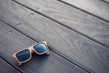 wooden sunglasses and wooden floor