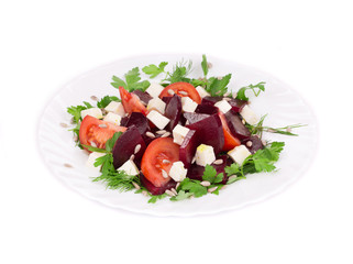 Beet salad with tomatoes and feta cheese.