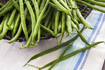 Sweet green beans in a basket - closeup