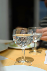 Sparkling water in glass on the table