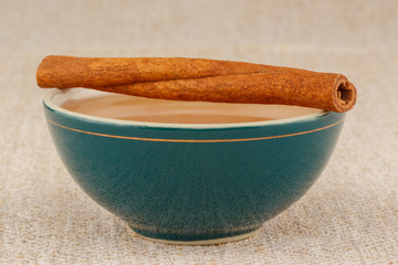 Honey in bowl with cinnamon