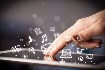 Finger pointing on tablet pc, social media concept