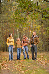 Happy family in forest