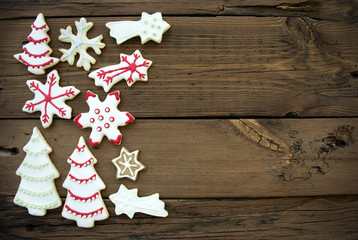 Naklejka na ściany i meble Wooden Background with Christmas Cookies and Copy Space