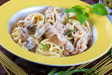 Italian pasta with sauce, beef and mushrooms