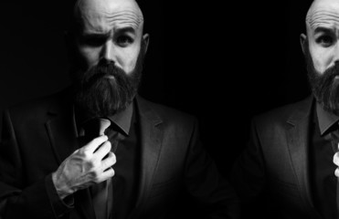 bearded in a suit and tie, businessman