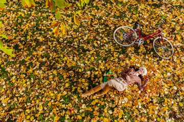 Young woman in autumn forest