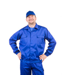 Worker with arms on waist.