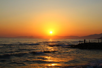 The sunset near the sea in Siide, Turkey