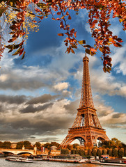 Obraz na płótnie Canvas Eiffel Tower with boat on Seine in Paris, France