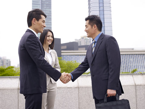 business people shaking hands