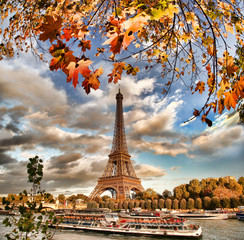 Naklejka na ściany i meble Eiffel Tower with boat on Seine in Paris, France
