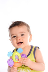 isolated studio portrait of lovely toddler baby boy playing