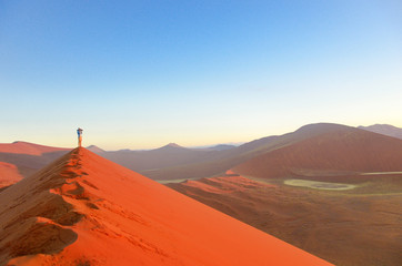Fototapeta na wymiar Sunrise dunes in Namib desert, Sossusvlei, South Africa