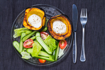 Acorn squash with sour cream and salad.