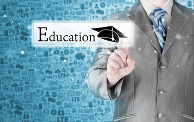 business man pointing 'education' concept