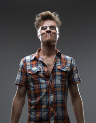 man with mouth sealed and eyes