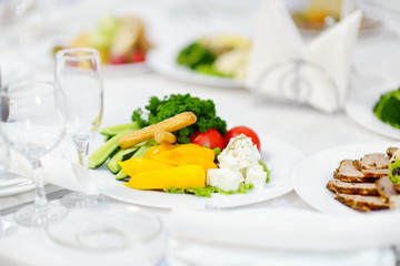 A plate with assorted meat snacks