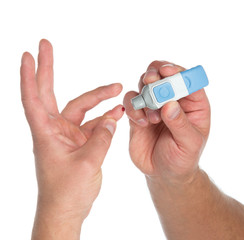 Diabetes lancet in hand prick finger to make punctures