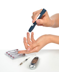 Diabetes diabetic concept finger prick measuring level blood tes
