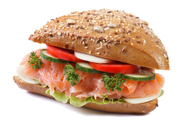 sandwich with salmon and vegetables closeup isolated side