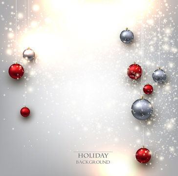 Elegant shiny Christmas background with baubles and place for te