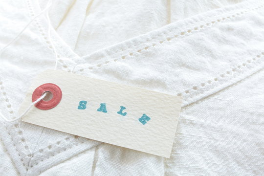 sale tag on linen wear