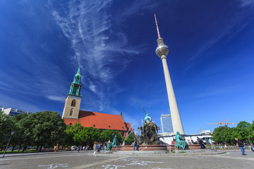 Berlin TV tower and Saint Mary's Church, Berlin, Germany © Noppasinw