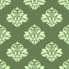 Fototapeta premium Floral seamless pattern with light green on dark green