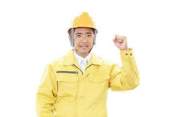 ガッツポーズの作業員