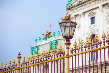 Fototapeten Congress Center golden fence and architecture detail in Vienna © PixAchi